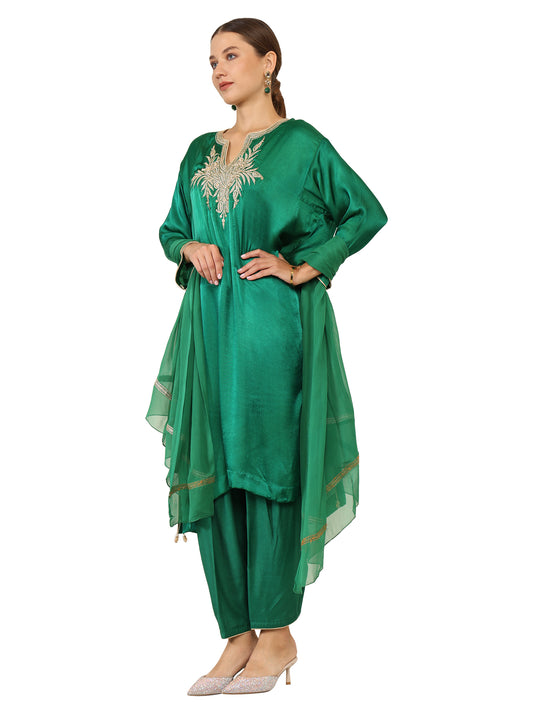 Bottle green satin silk suit with gold Tila work and matching green duppatta. Ideal for a formal occasion